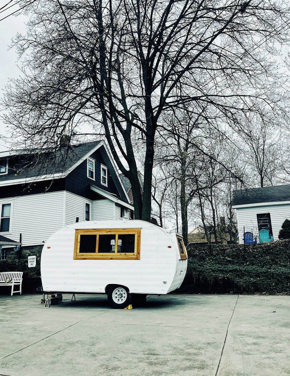 a trailer parked in front of a house