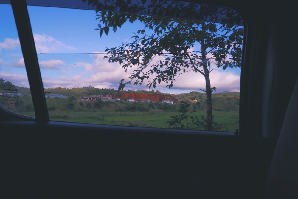 a view of a field through a window