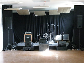 a stage with speakers and a microphone