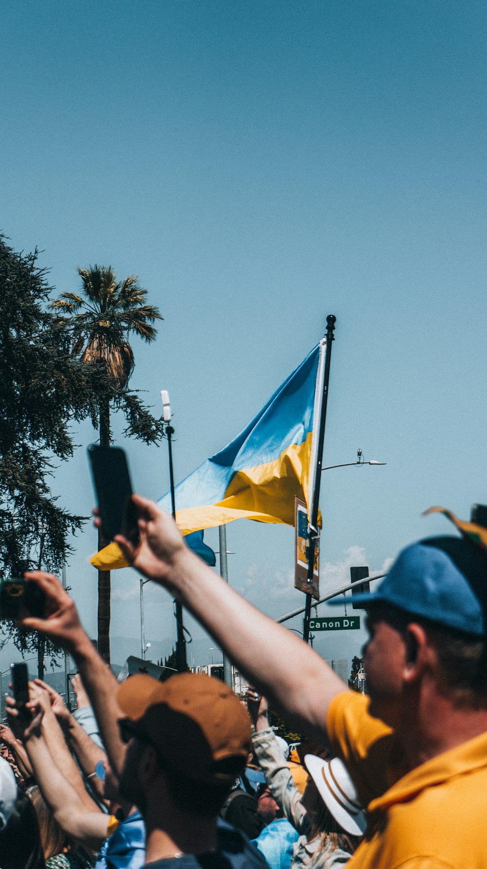 a group of people holding flags