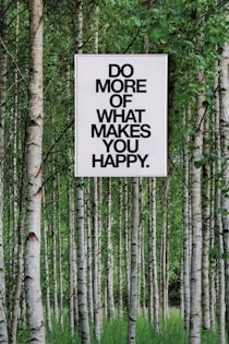 a sign in the woods