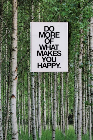 a sign in the woods