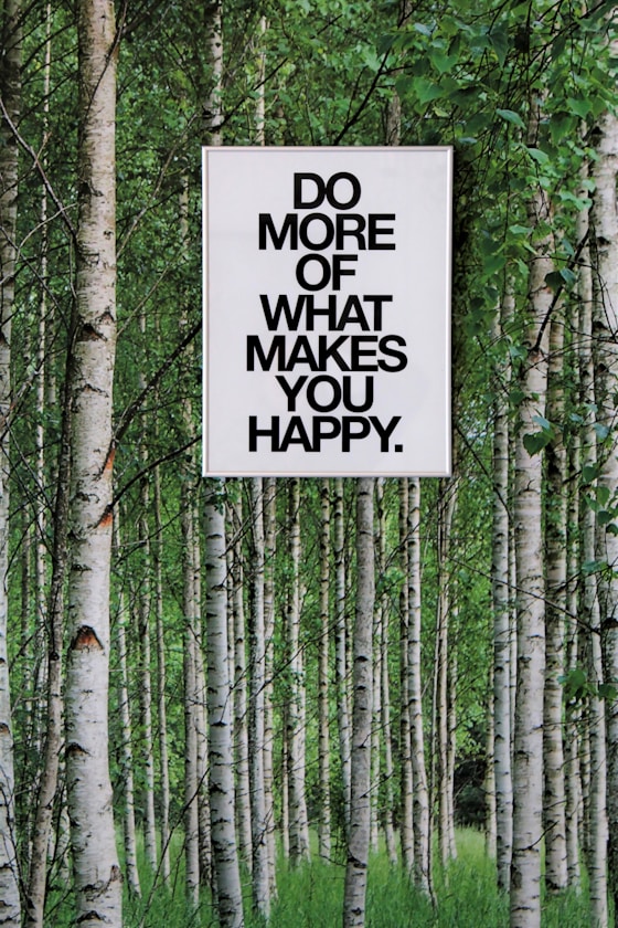 a sign in the woods