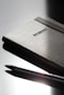 a close-up of a grey wallet