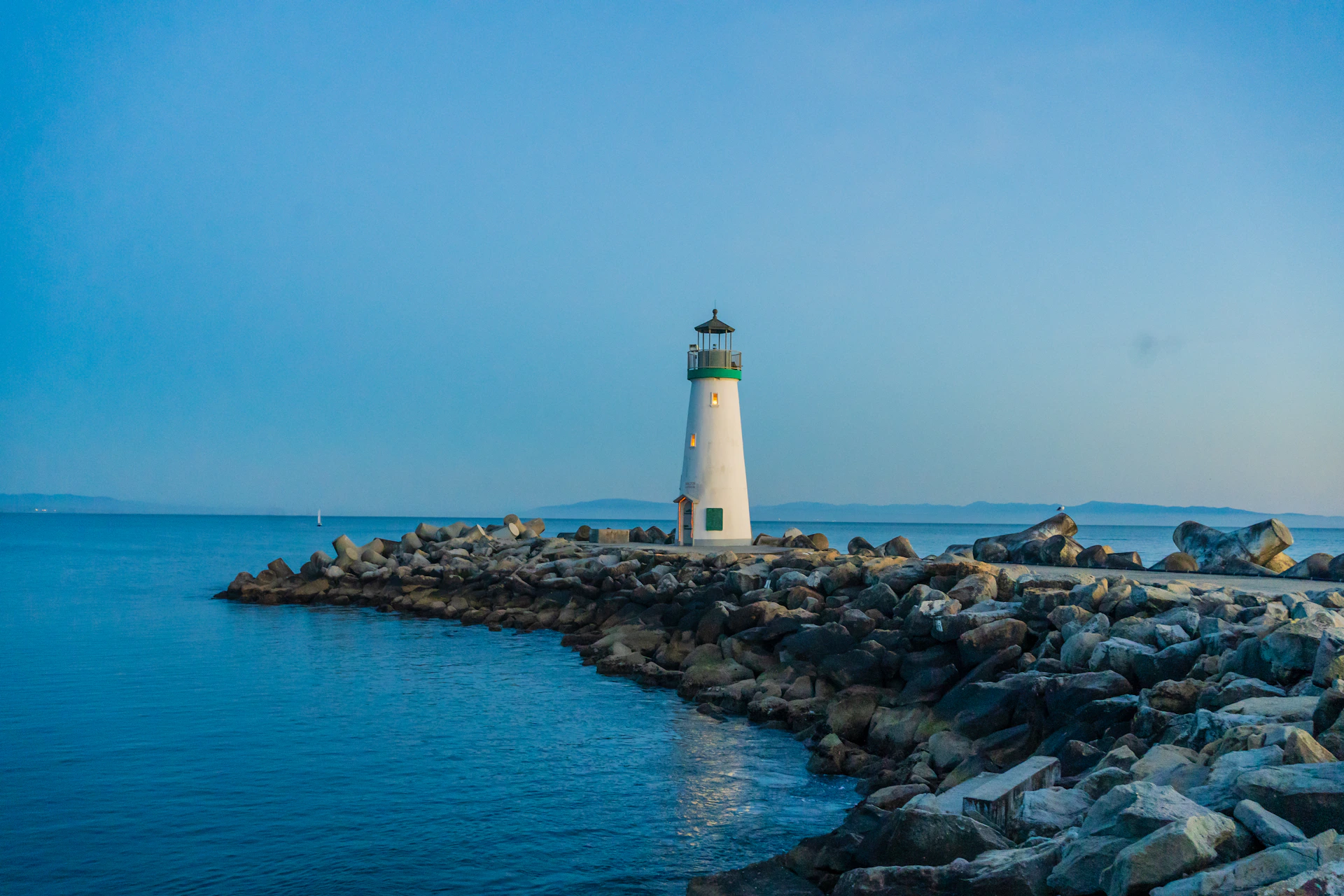 a lighthouse on a rocky shore
