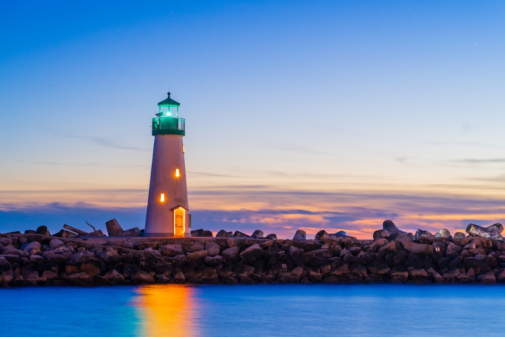 a lighthouse on a rocky shore