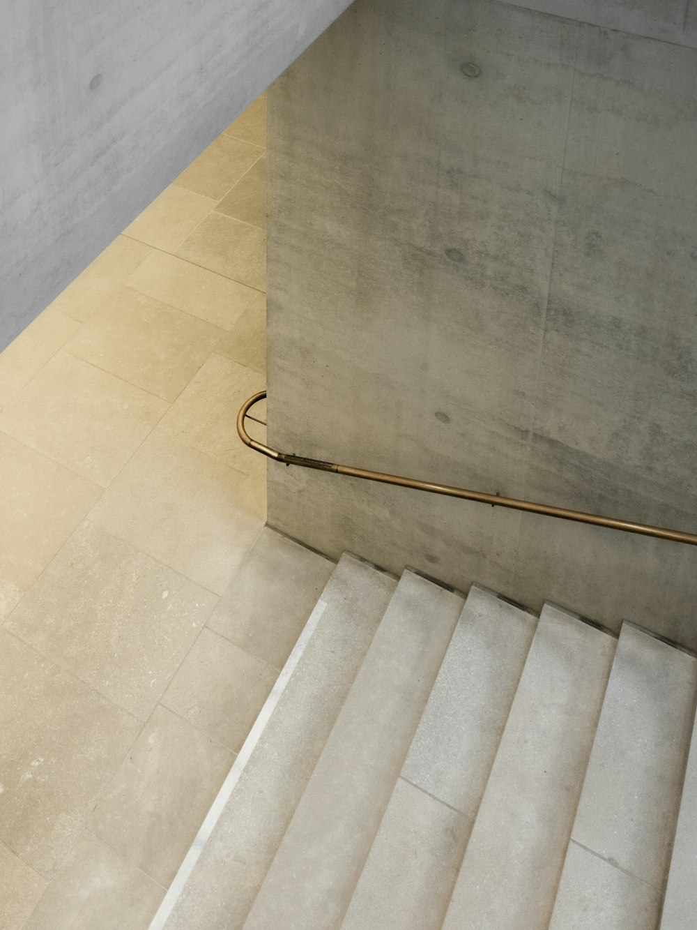 a metal grate on a tile floor