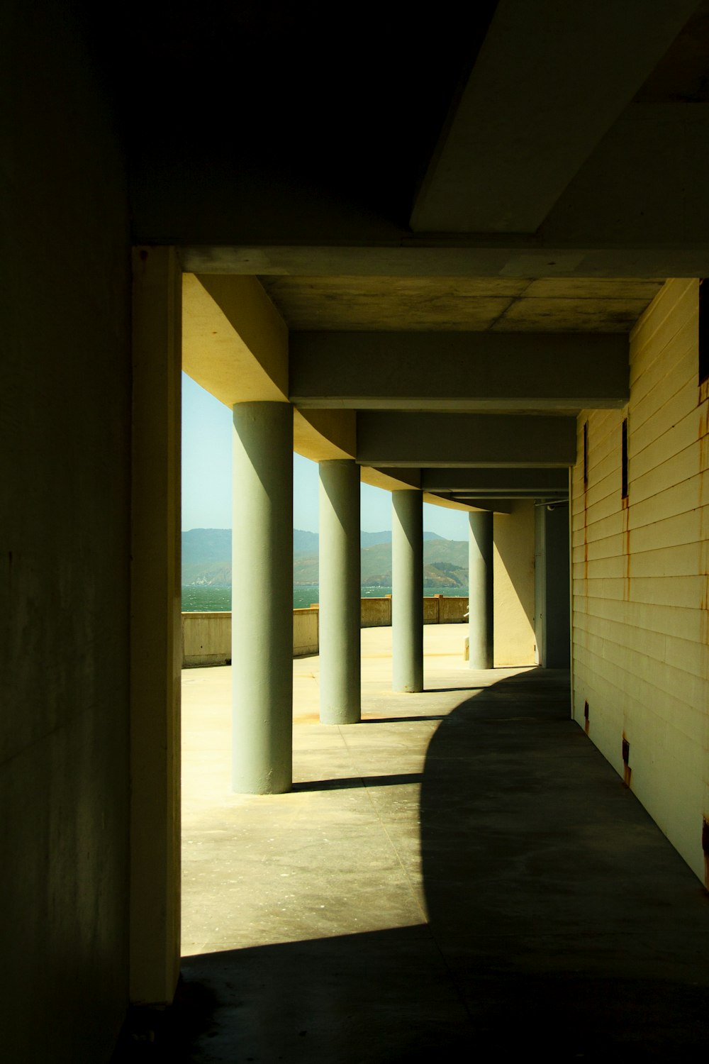 a hallway with columns