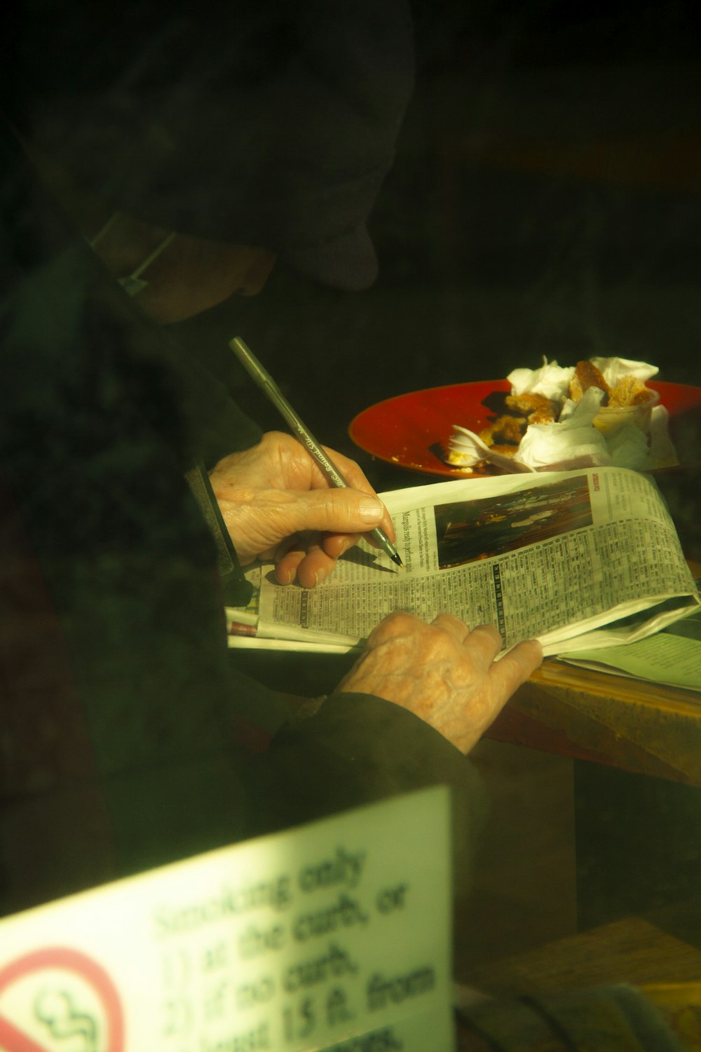 a person holding a cigar