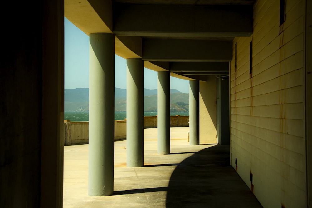 a hallway with pillars