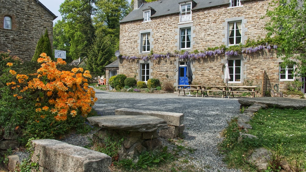 a stone path leading to a house