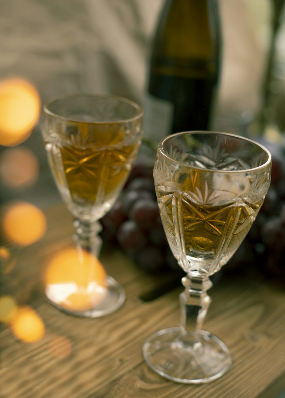 two glasses of wine on a table