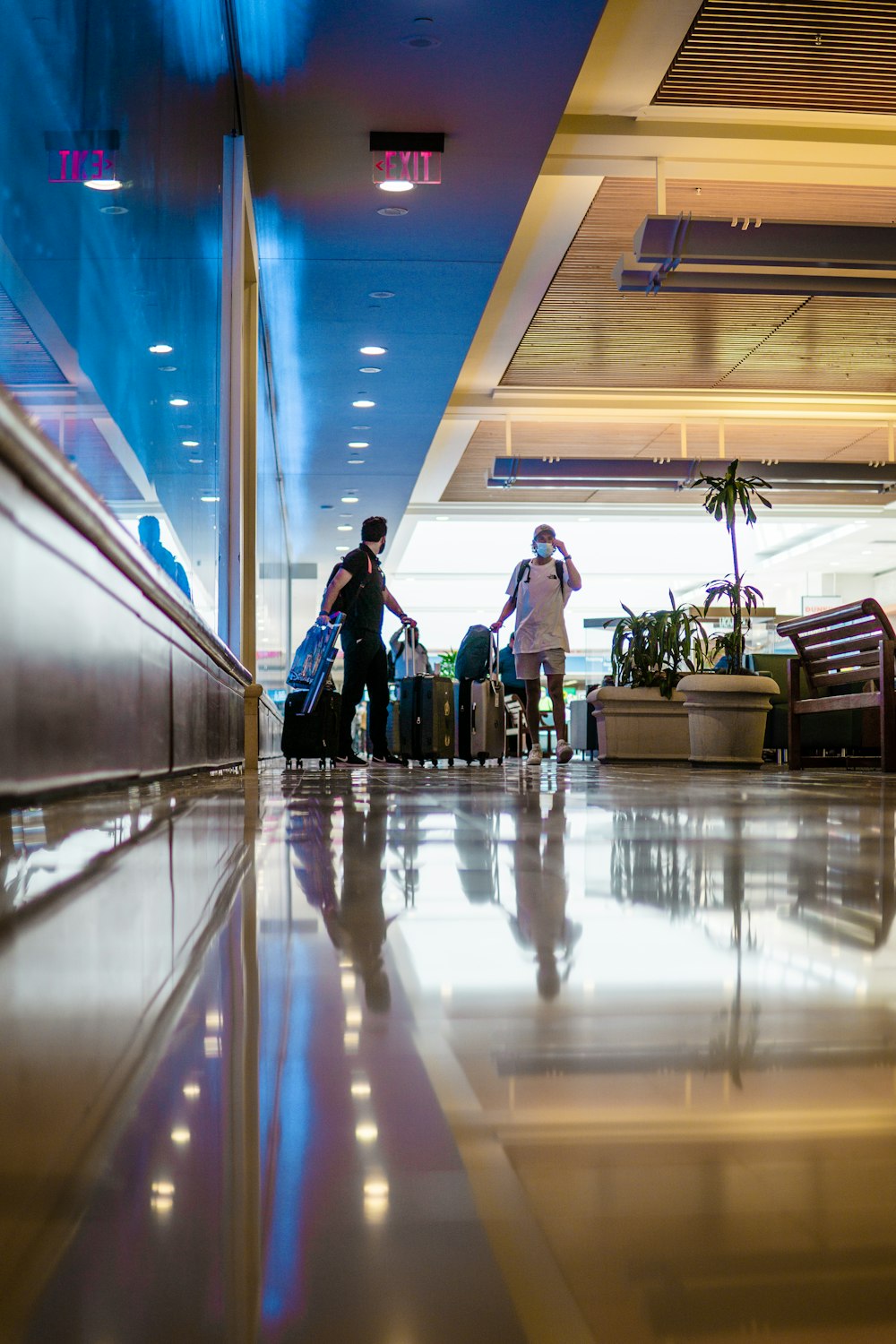 a couple of people with luggage