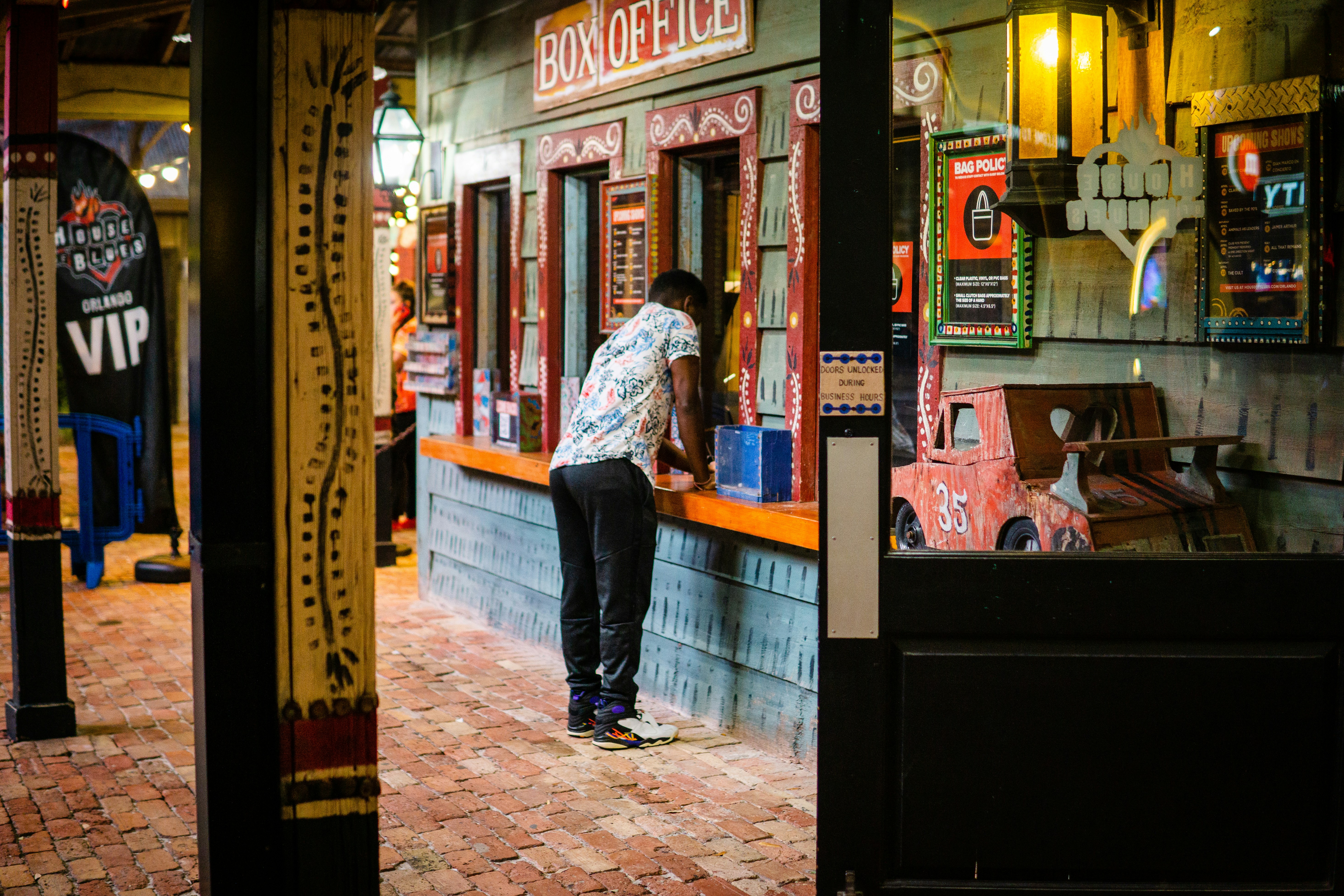 A person standing in front of a storefront photo – Free Buena vista ...