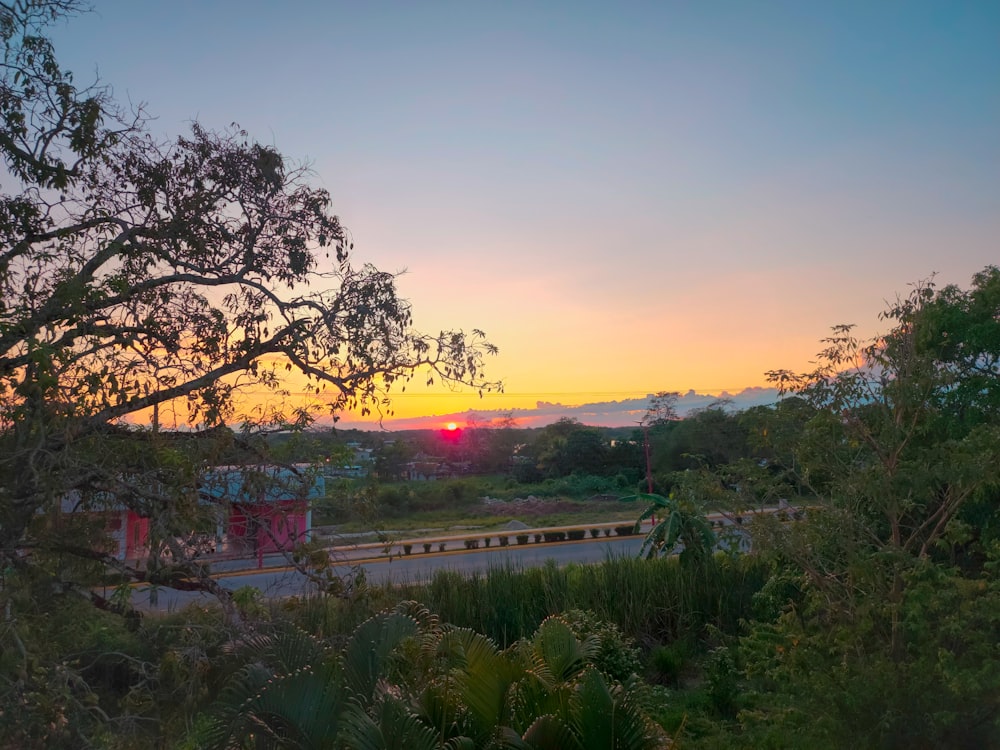 a sunset over a city