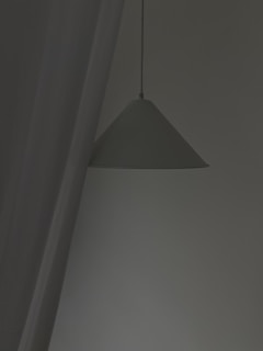 A minimalist pendant lamp that adds sophistication to any space.