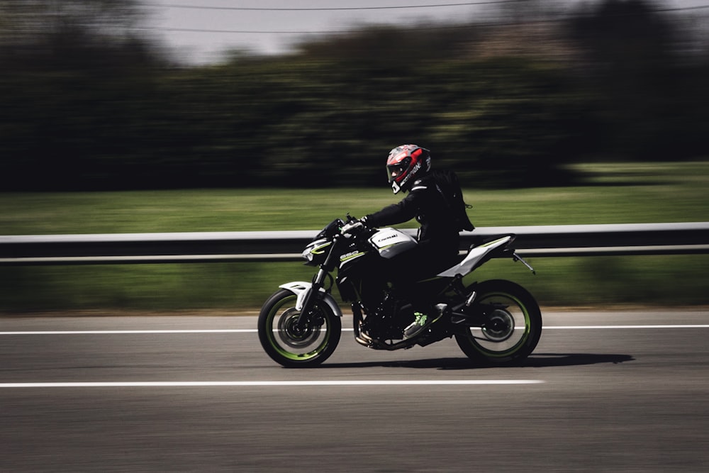 a man riding a motorcycle