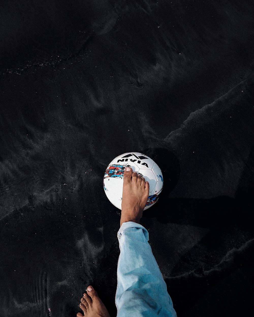 a person holding a white object