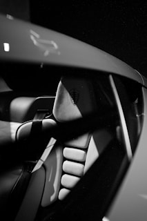 Close-up of a Seat car emblem on a sleek vehicle