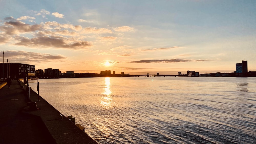 a body of water with buildings along it