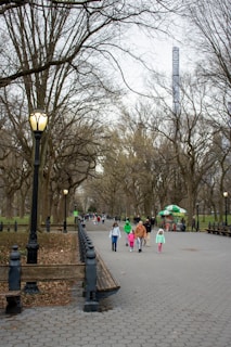 people walking on a sidewalk