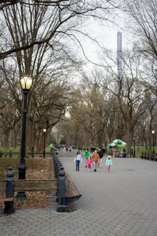 people walking on a sidewalk