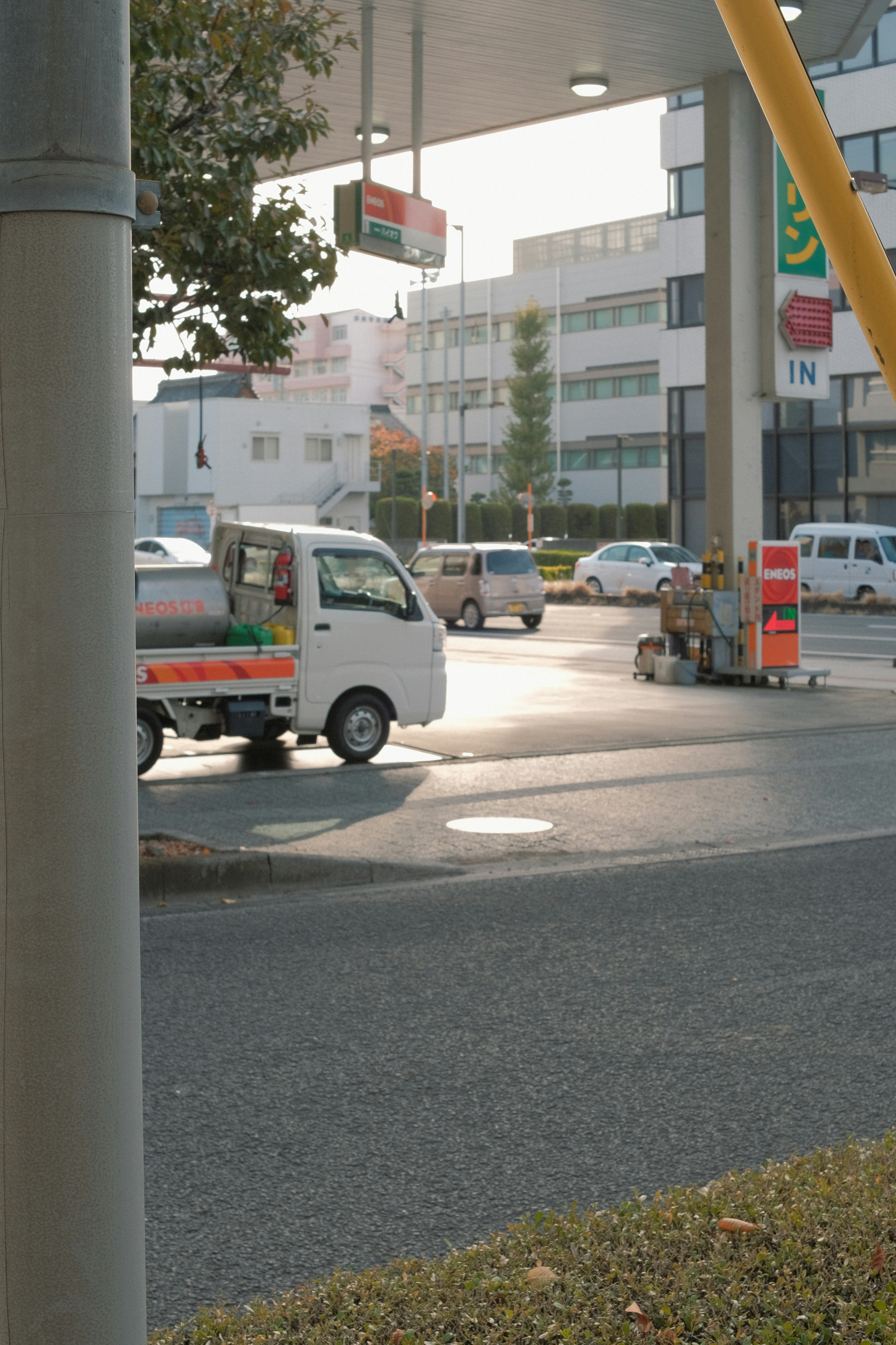 A white truck parked on the side of a road photo – Free Grey Image on ...