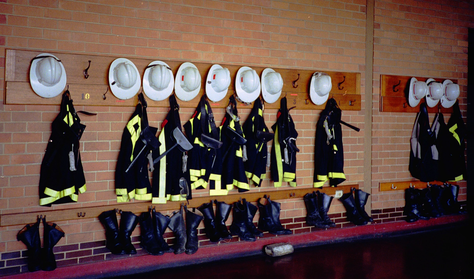 a group of people in black and white clothes with white hats and black and white hats on