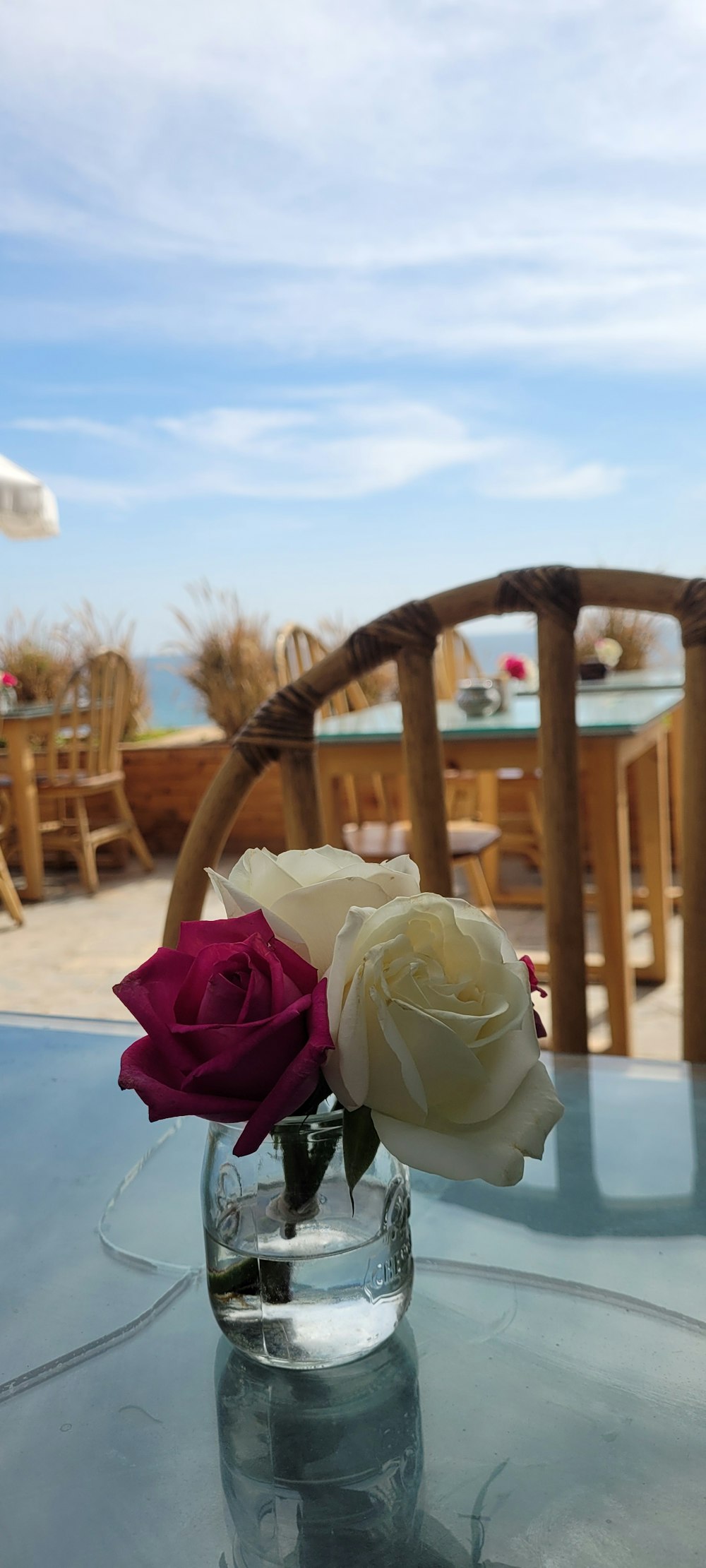 a vase with flowers on a table