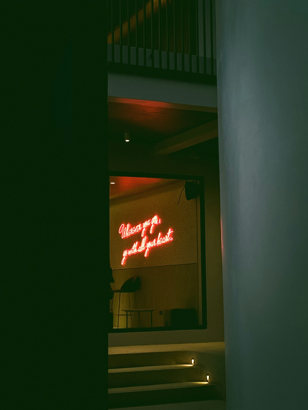 a neon sign on a building