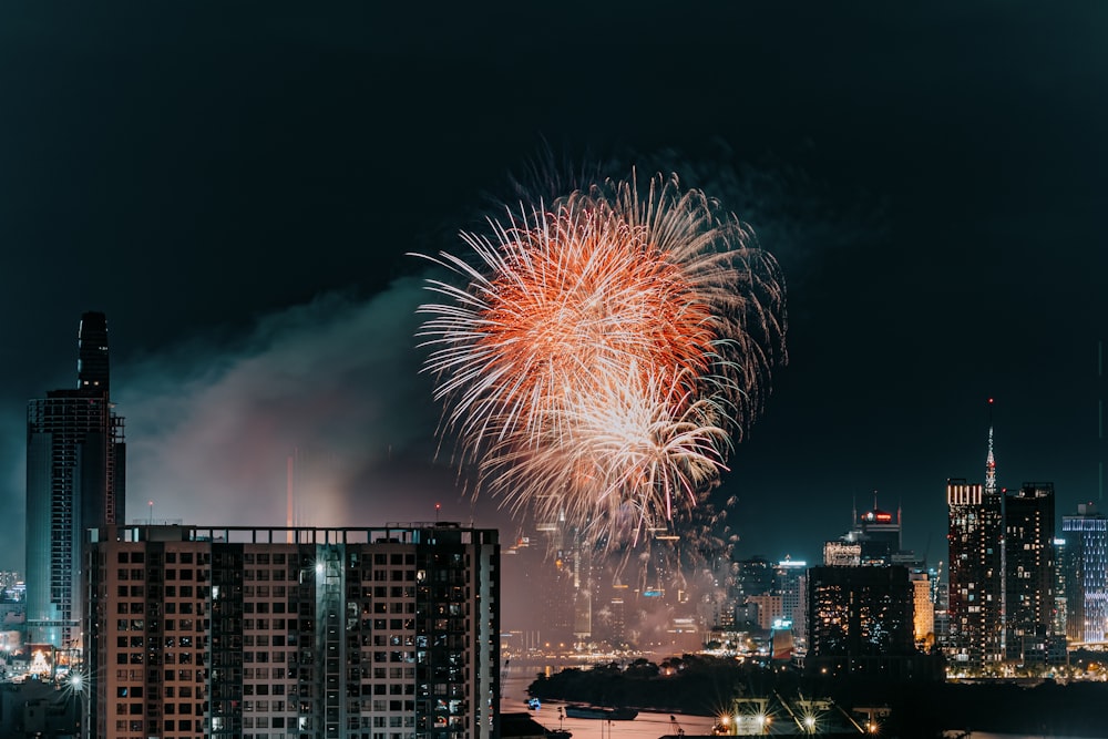 fireworks in the sky over a city