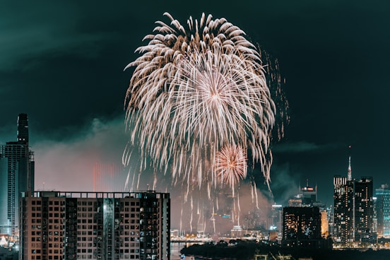 fireworks in the sky over a city