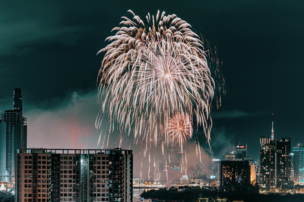 fireworks in the sky over a city