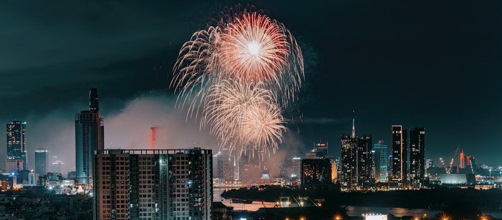 fireworks in the sky over a city