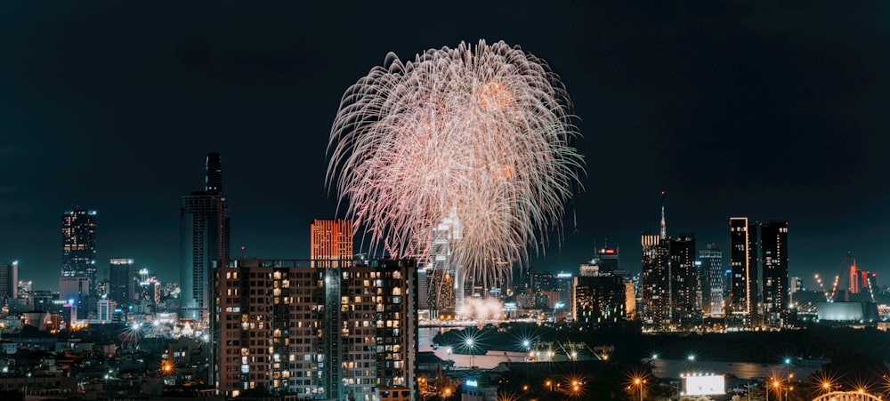 fireworks in the sky over a city