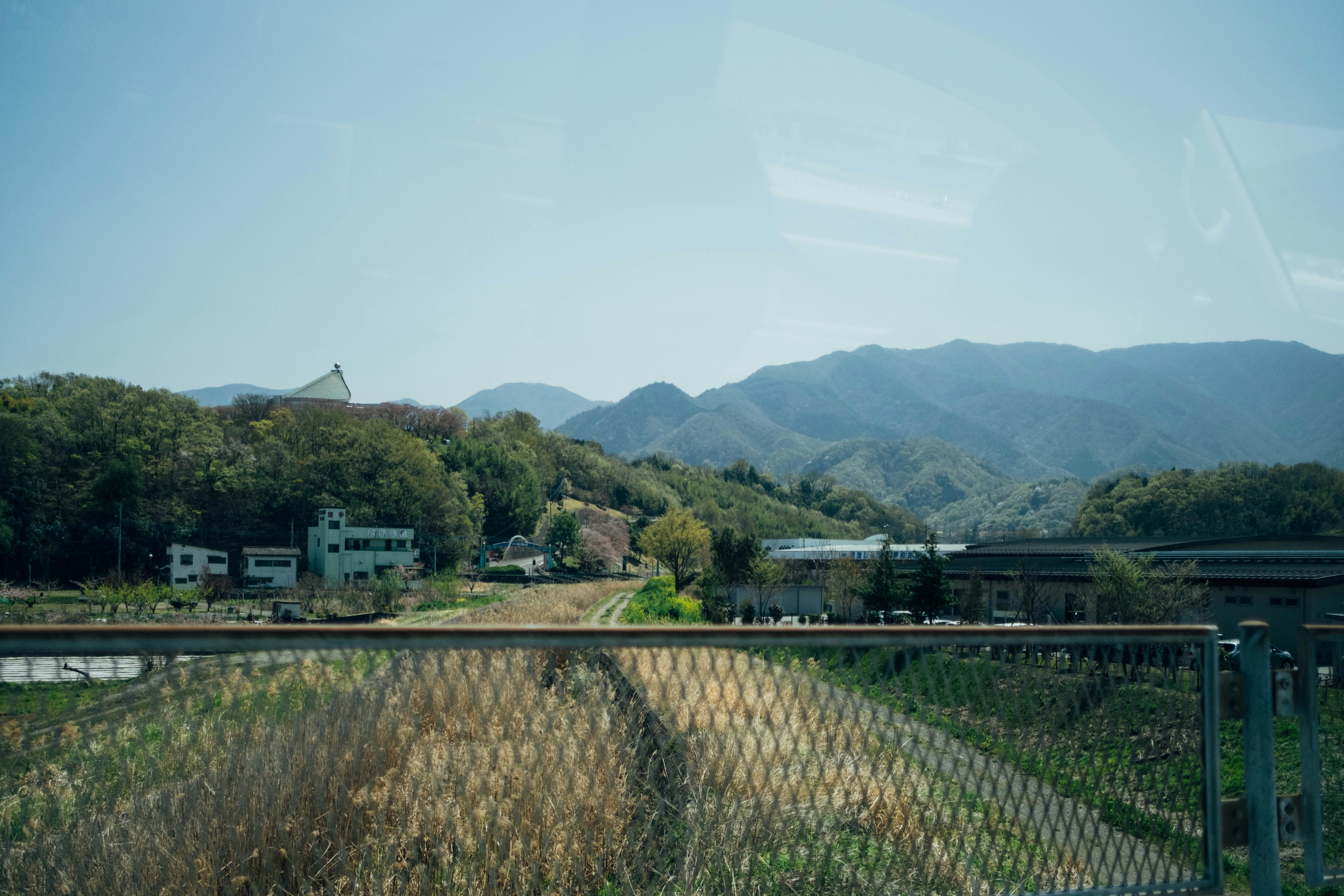 Local train winding through the Japanese countryside