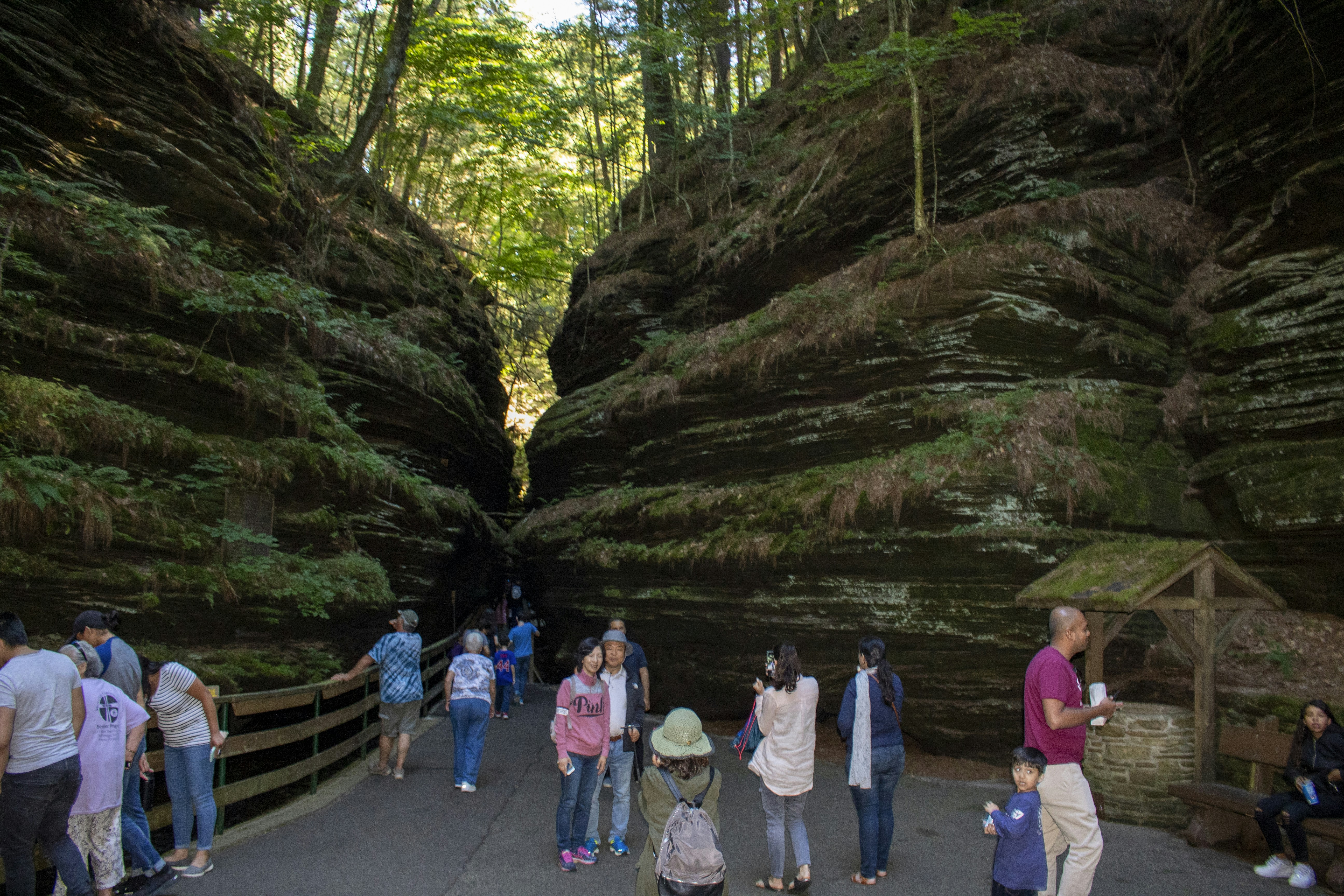 a group of people standing in a cave