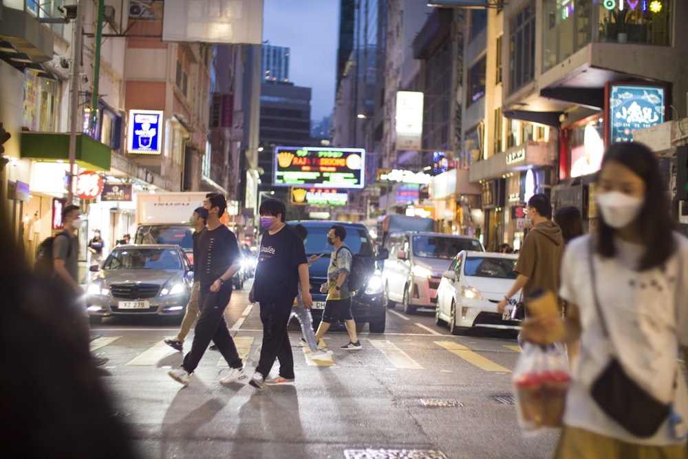 a busy street with people and cars