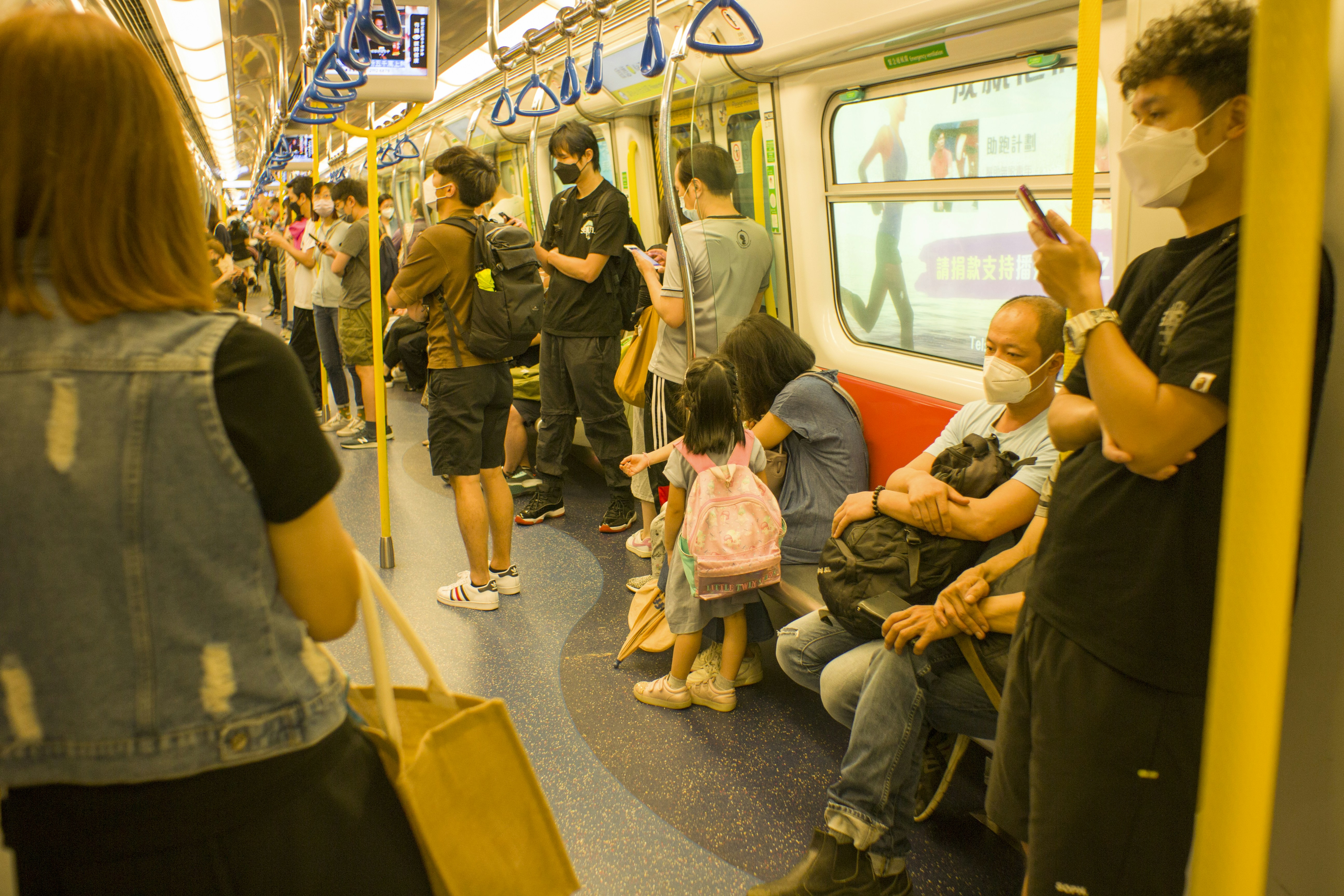 a group of people on a subway