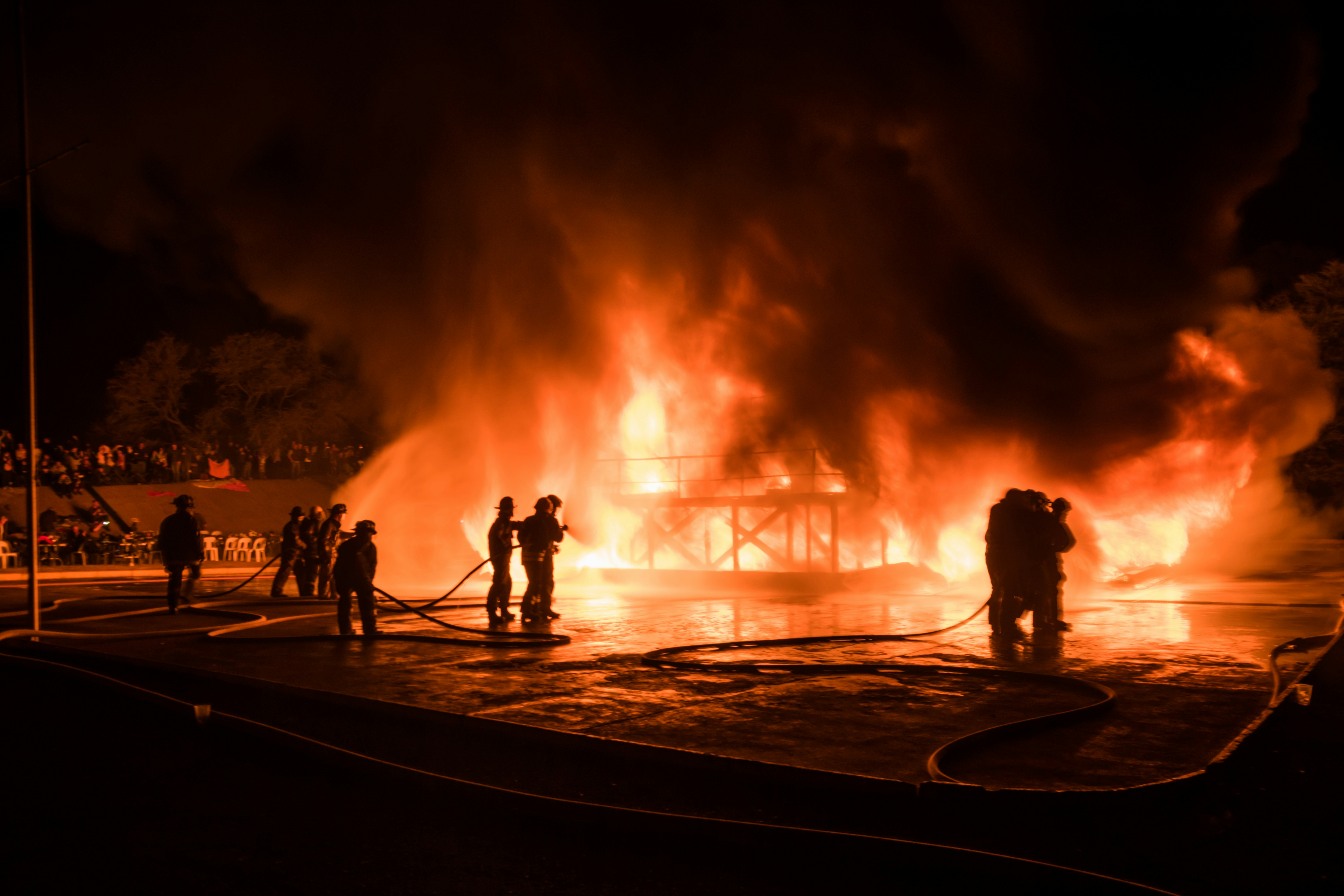 Firefighters in full gear during a training exercise.