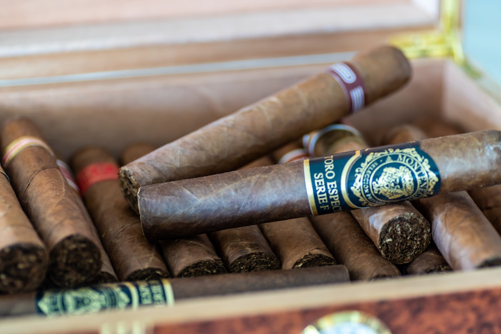 a group of cigars in a box