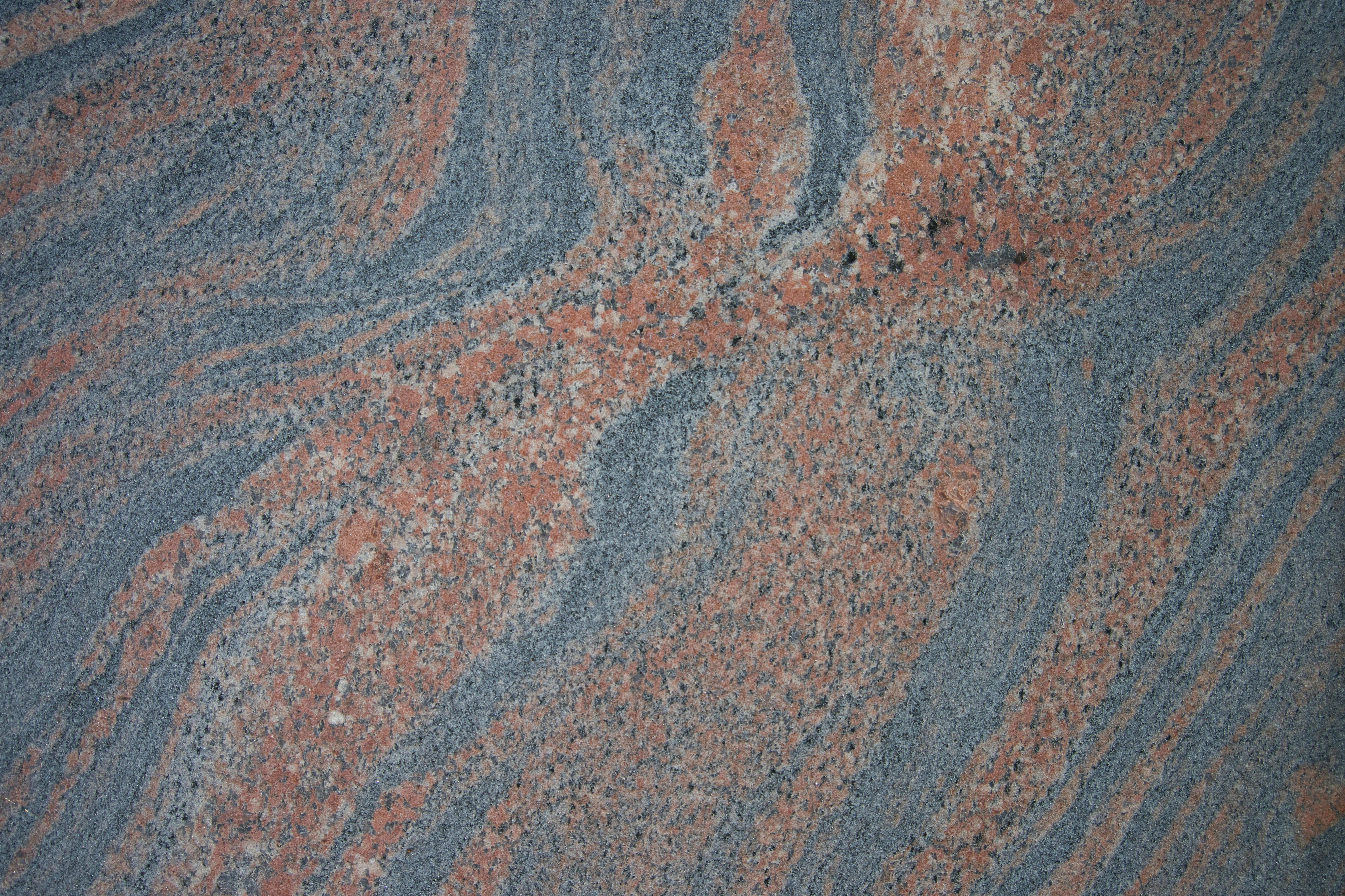 a close-up of a red rock