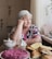 A vibrant image of Frau Schmidt in a restaurant setting.