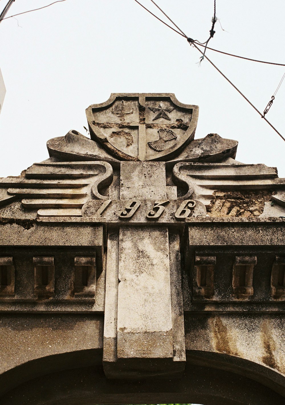 a stone building with a sign on it