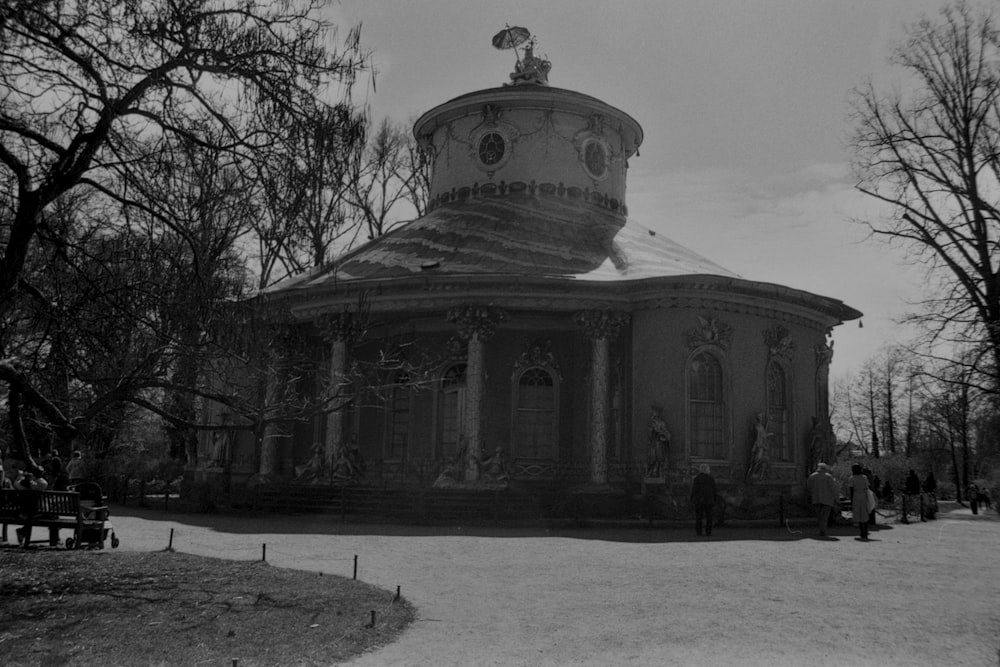 a building with a dome and a clock on top