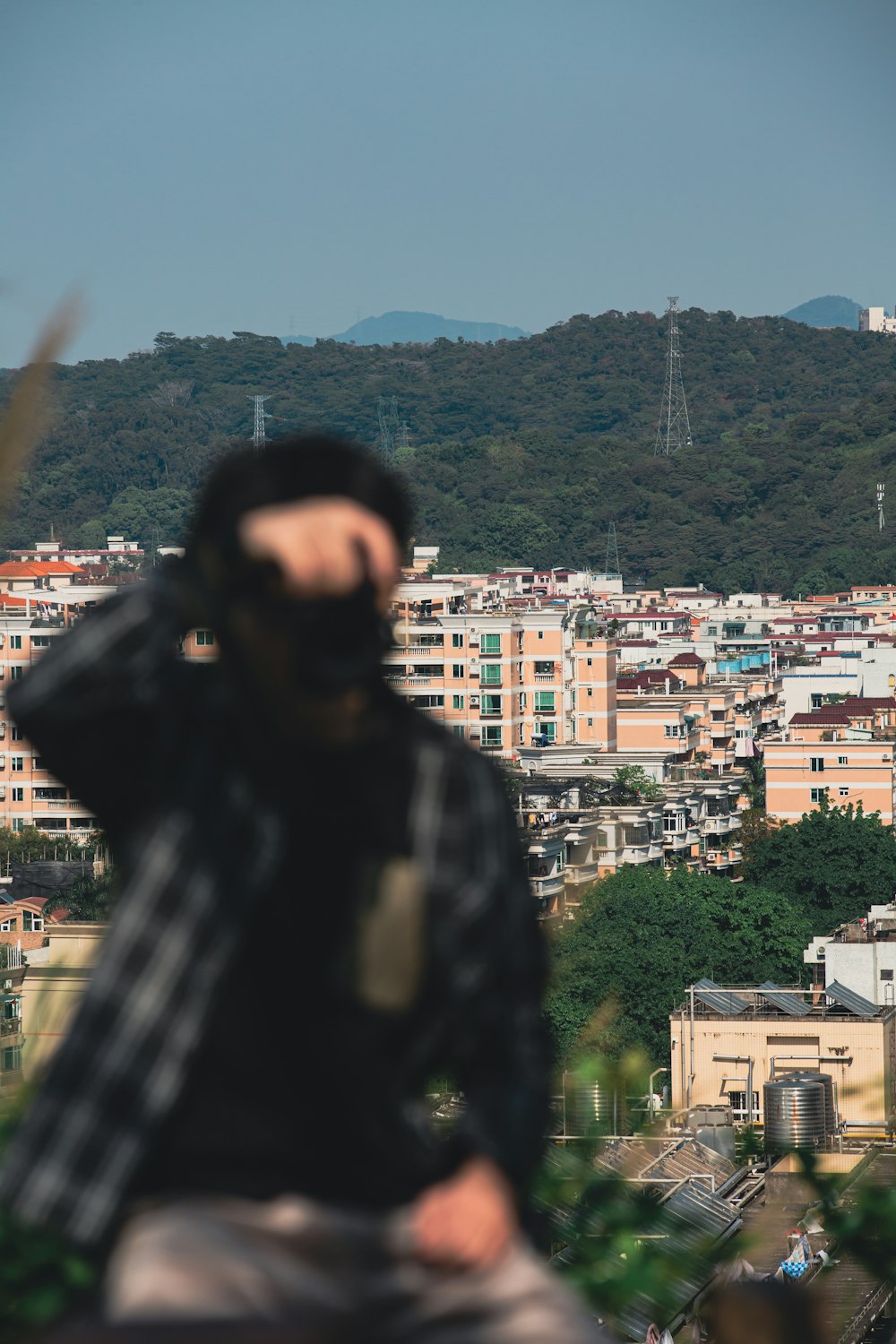 a man looking out over a city