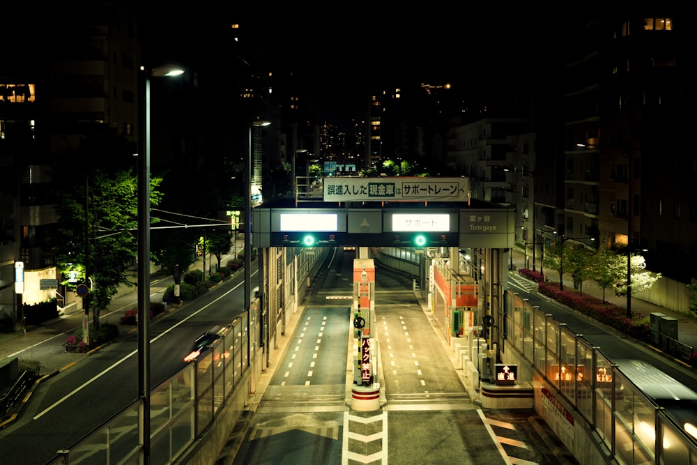 a street with signs and lights