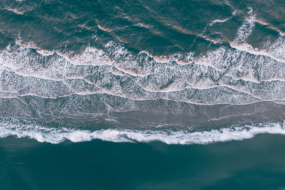 a man riding a wave in the ocean