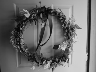 a black and white photo of a flower arrangement