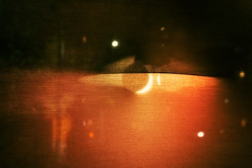 New work showcasing abstract shapes and textured ink layers in warm tones.